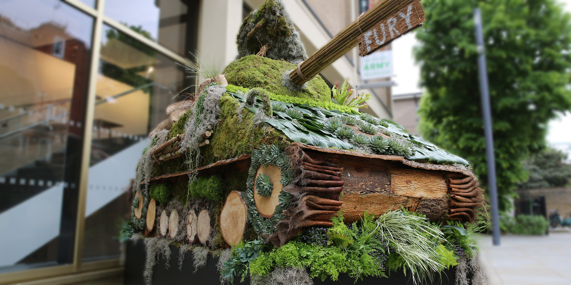 Floral Fury tank installation outside the National Army Museum for Chelsea in Bloom week