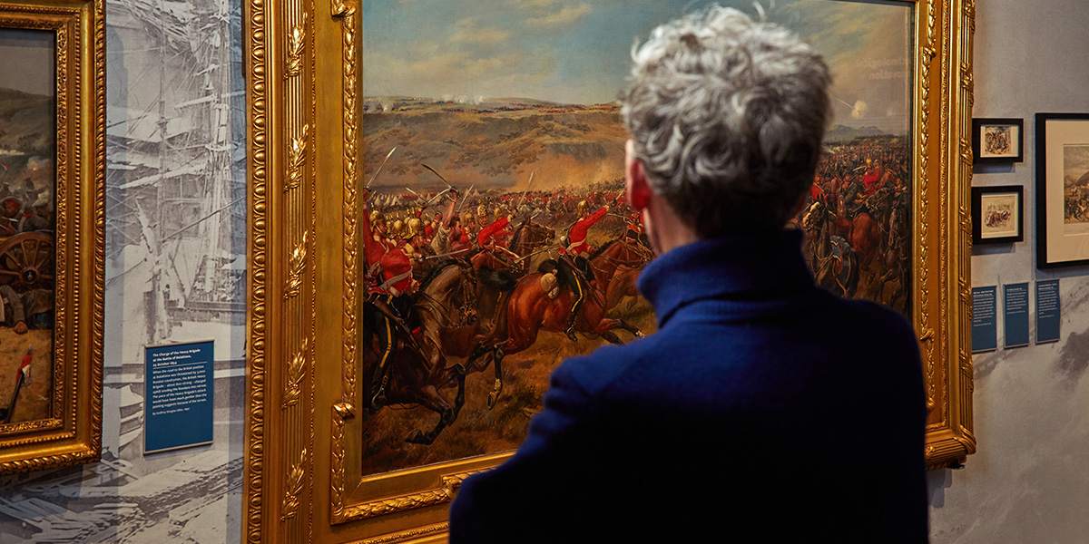 Museum visitor looking at a Crimean War painting