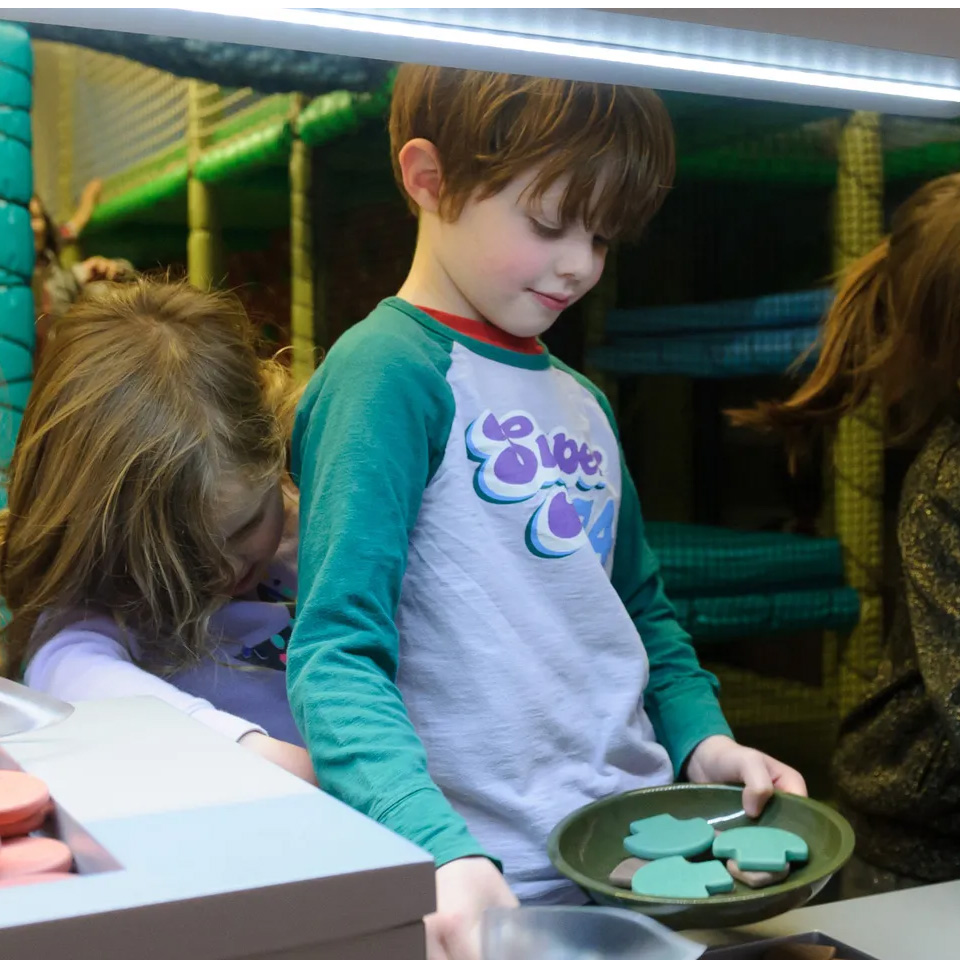 Children in the Play Base cookhouse