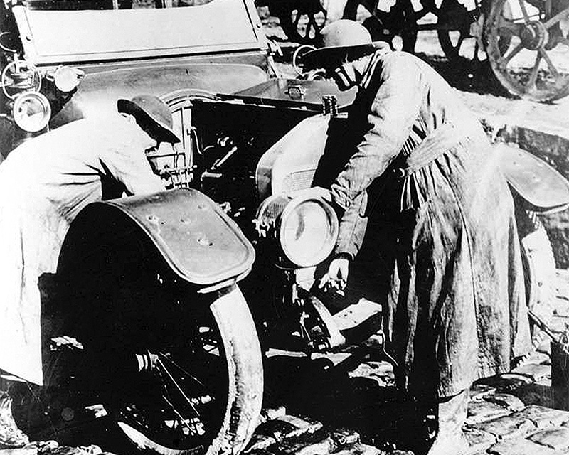QMAAC mechanics repair a car, 1918