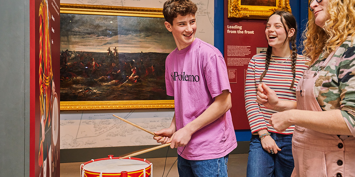 A family playing on the battle drum in the Conflict in Europe gallery