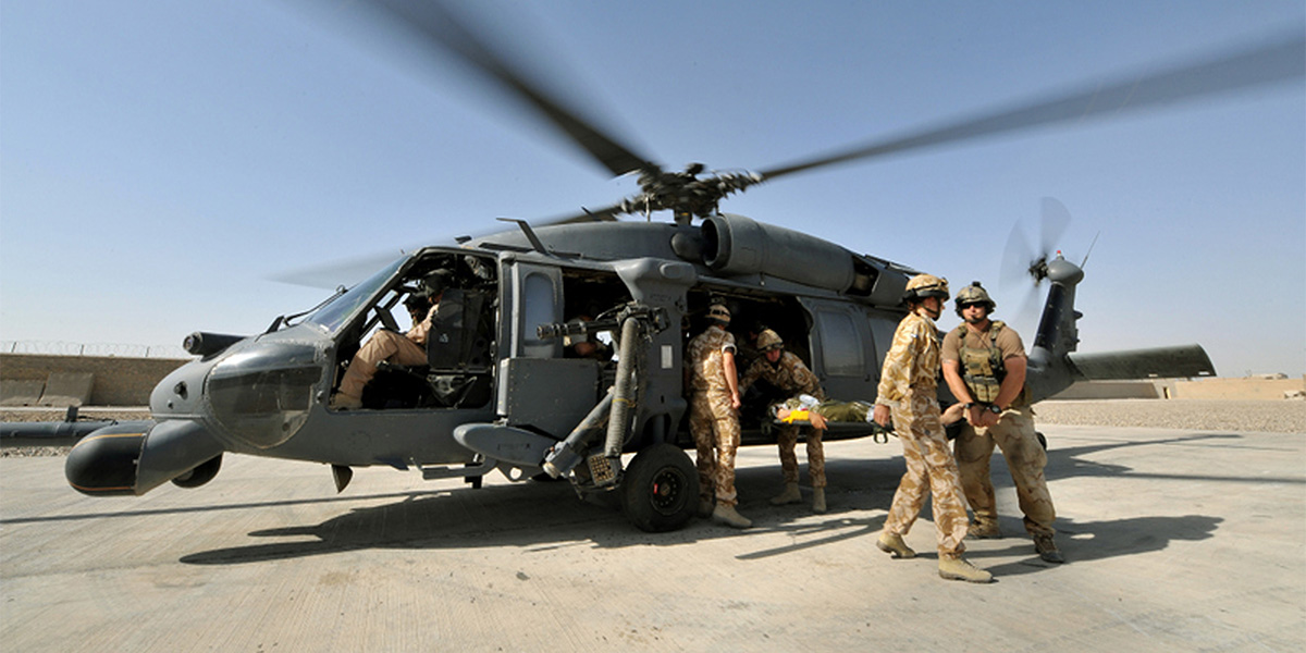 Patients are flown into the medical centre at Lashkar Gah, Helmand, 2009