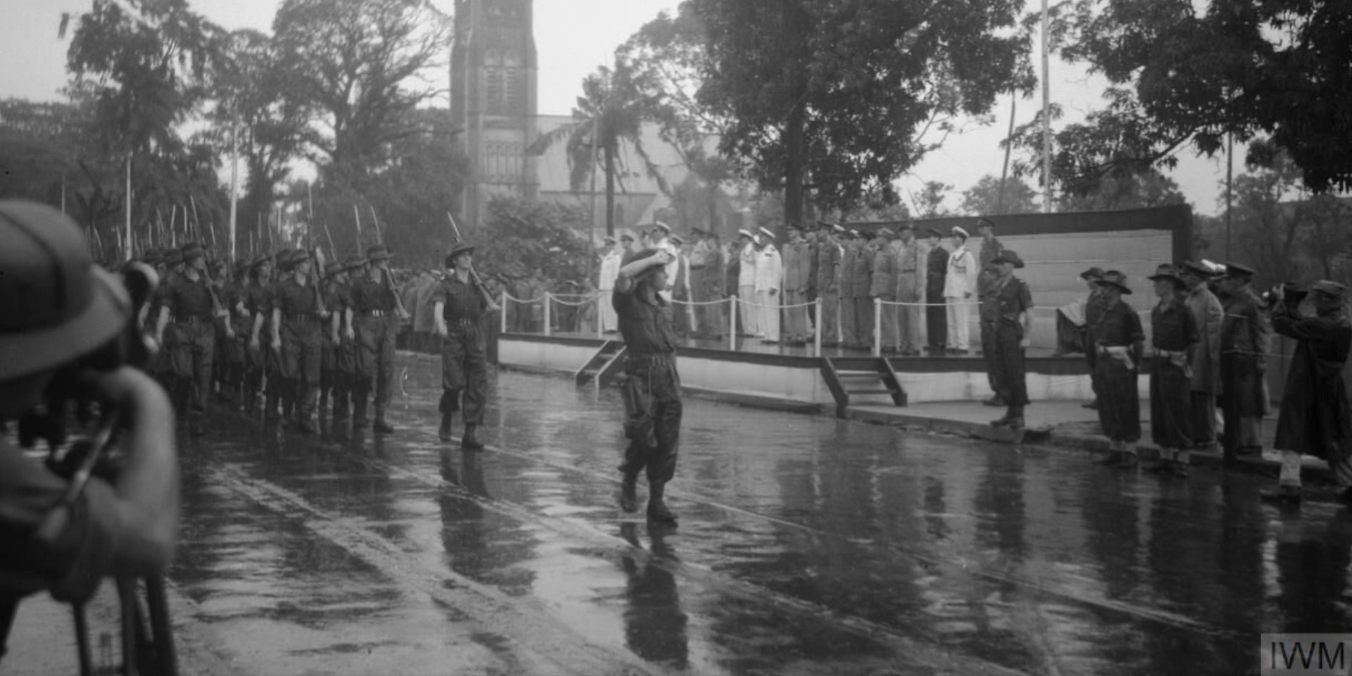 Admiral the Lord Louis Mountbatten takes the salute during the Rangoon Victory Day Parade, 15 June 1945