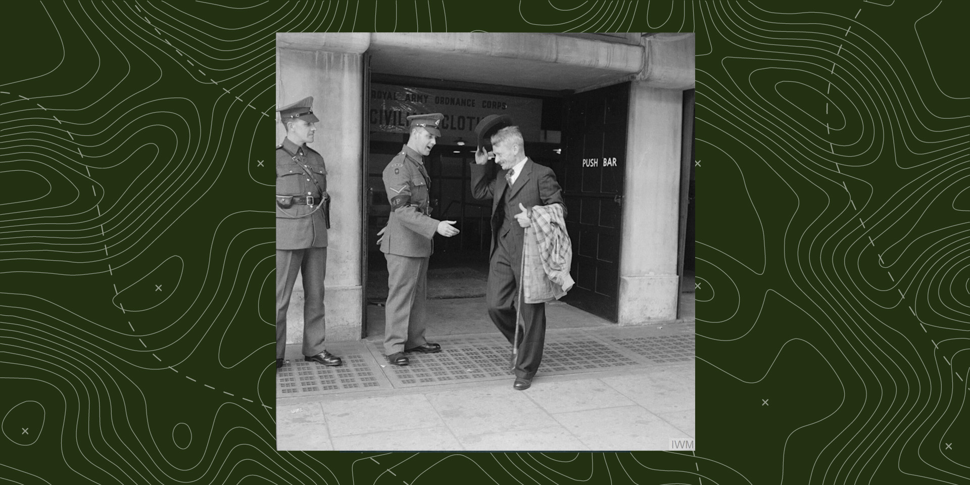 Mr Bill Krepper, late of the Pioneer Corps, leaves the demobilisation clothing depot at Olympia, London, as a civilian, wearing his demob suit, July 1945