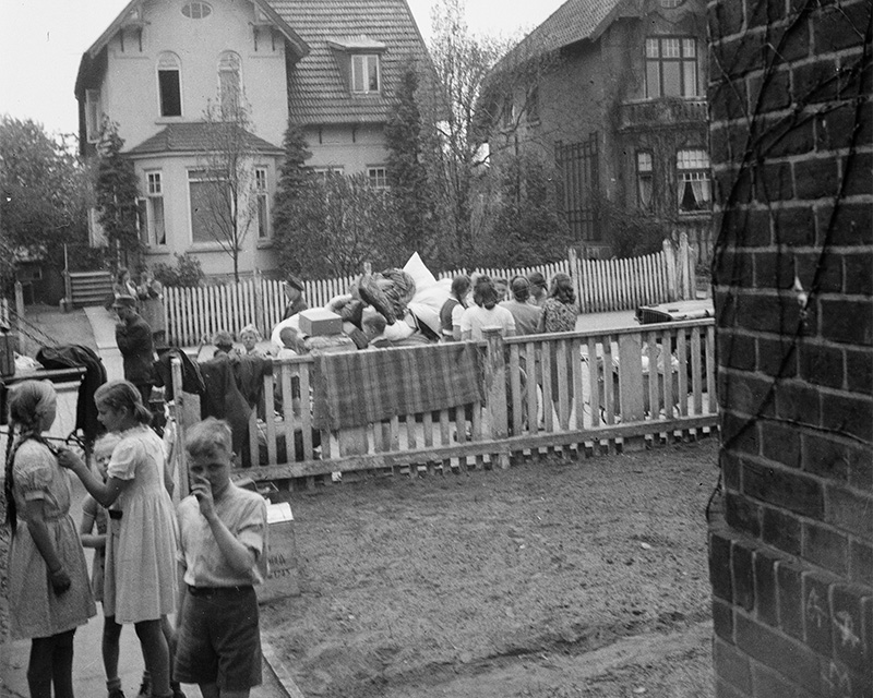 Civilians evacuating their houses in Elmshorn, Germany, 1945