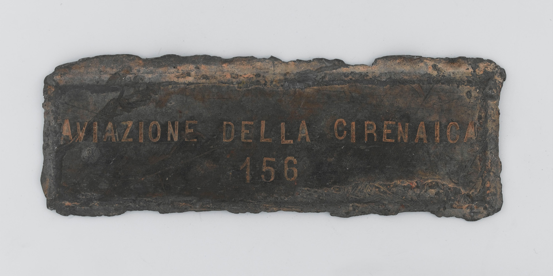 Plaque from the wreck of an Italian Savoia Marchetti SM79 aircraft destroyed by the LRDG at Jebel Uweinat, c1940