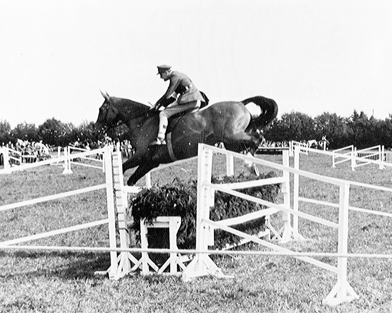 ‘Lieutenant Bill The Earl of Harrington takes the jumps’, Kappeln, Germany, September 1945
