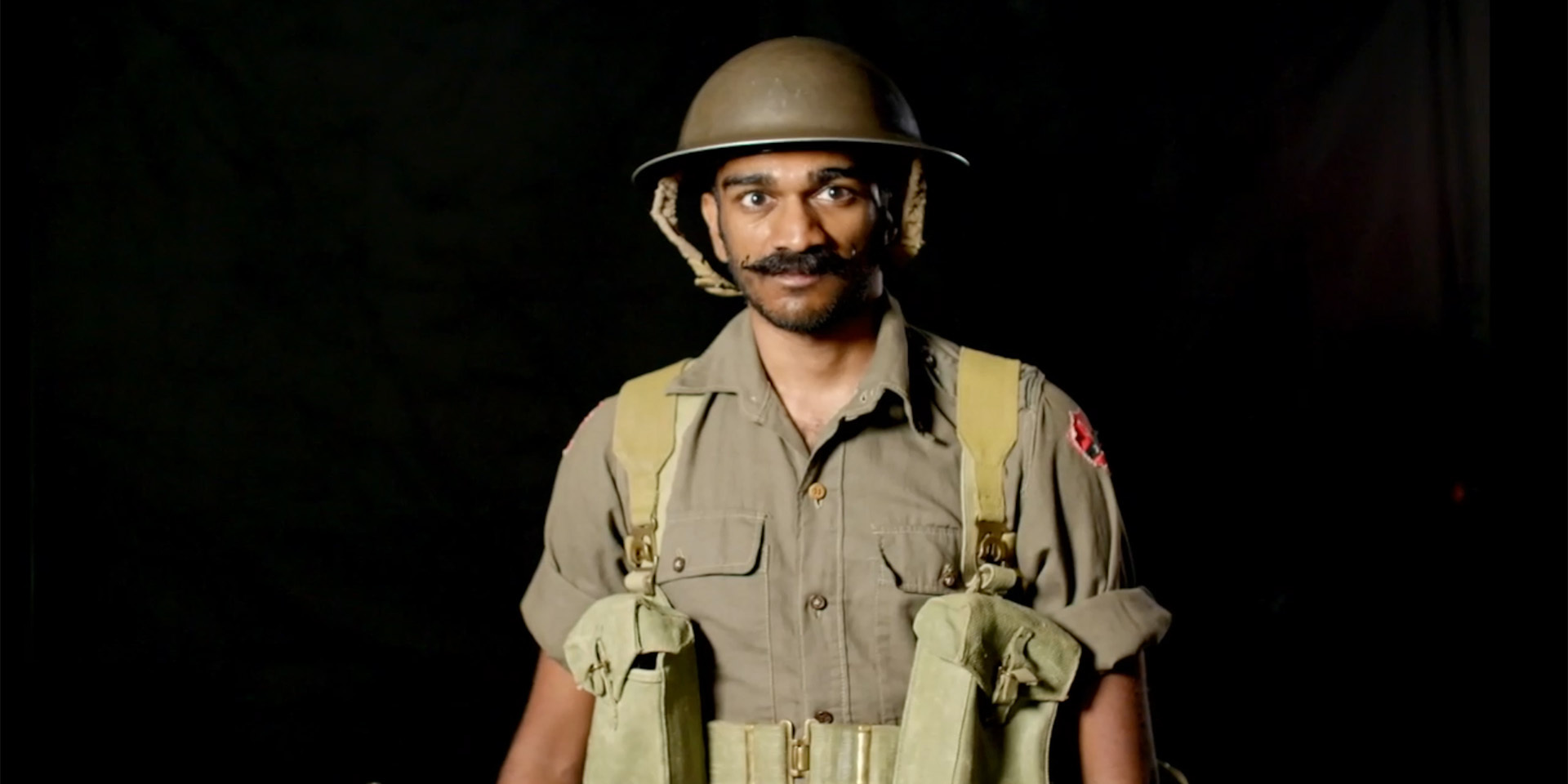 A live interpreter dressed as a British Indian Army soldier in Burma during the Second World War