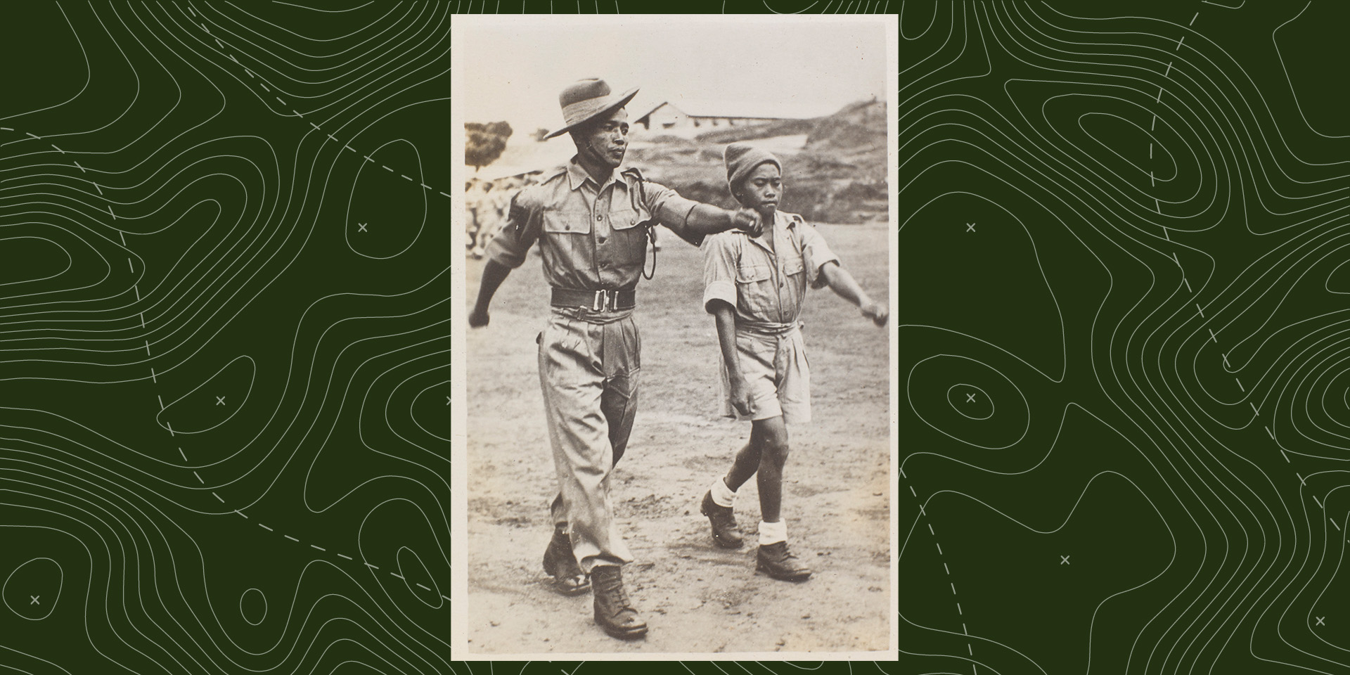 Teaching a new recruit to the Assam Regiment to march, c1943