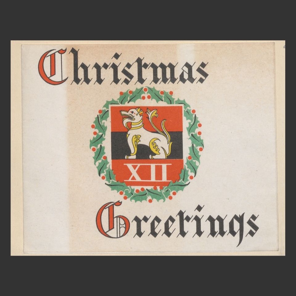 Christmas card with military insignia on it