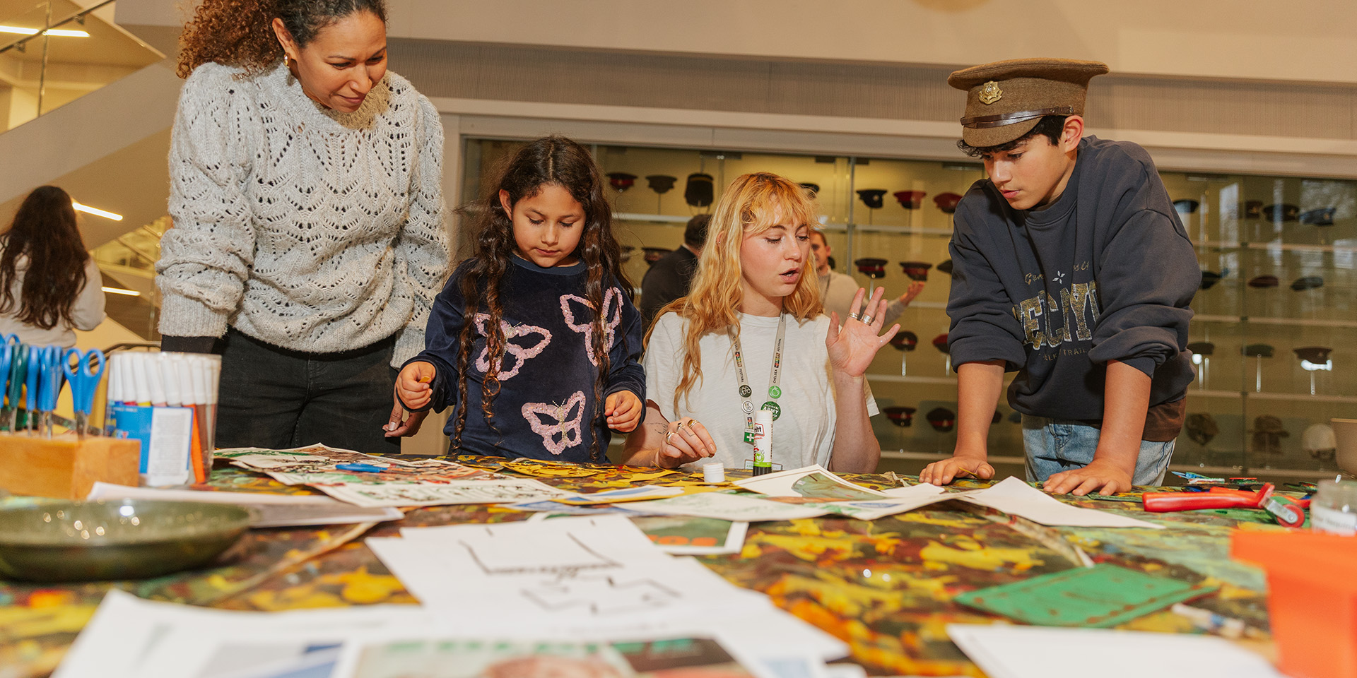 Family taking part in a craft workshop