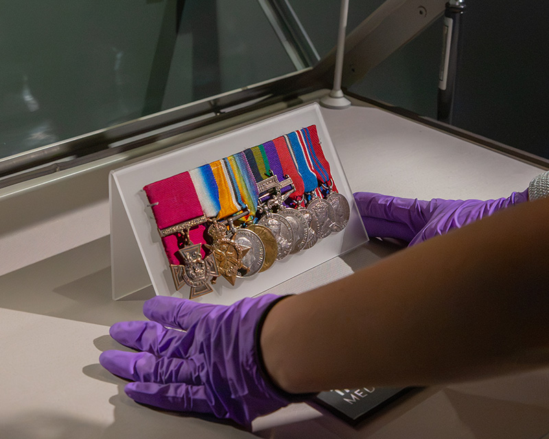 Khudadad Khan's medal group being mounted in a display case