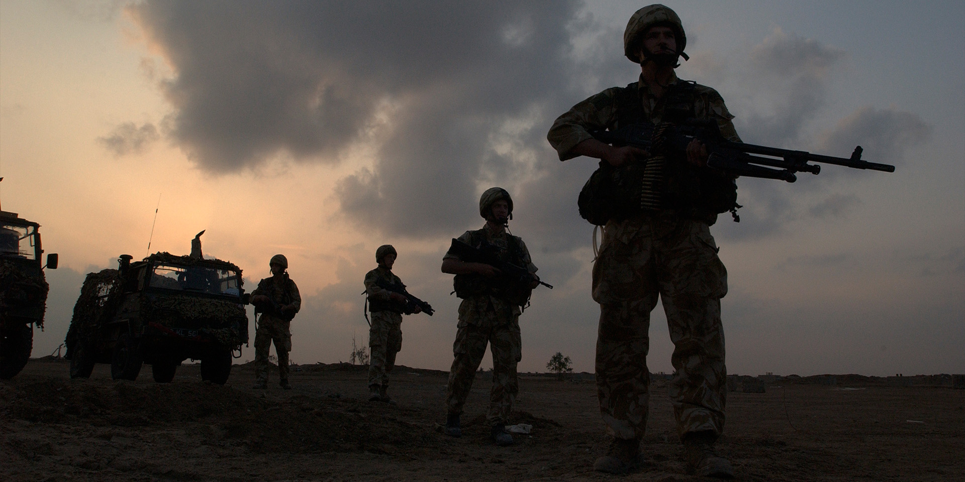 Silhouetted soldiers in Iraq, 2004