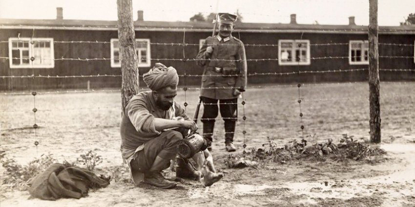 An Indian prisoner at Halbmondlager preparing for prayers, c1916