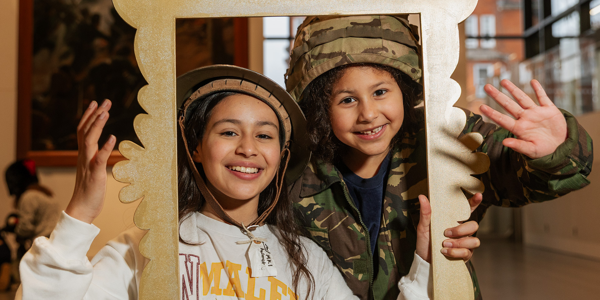 Children taking a selfie in the Atrium at the National Army Museum