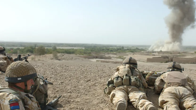 British soldiers watching the bombing of an enemy position in Musa Qala, 2006