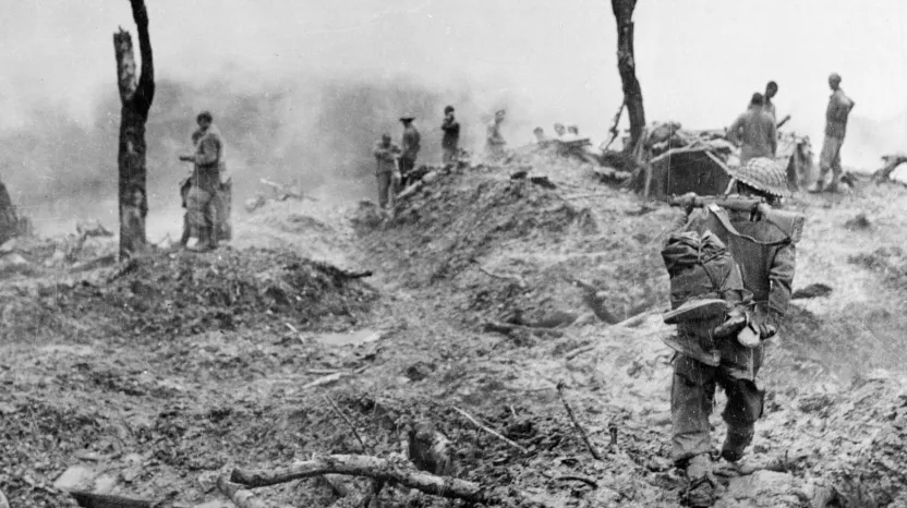 Men of the 10th Gurkha Rifles clearing enemy positions on 'Scraggy' hill, Burma, 1944