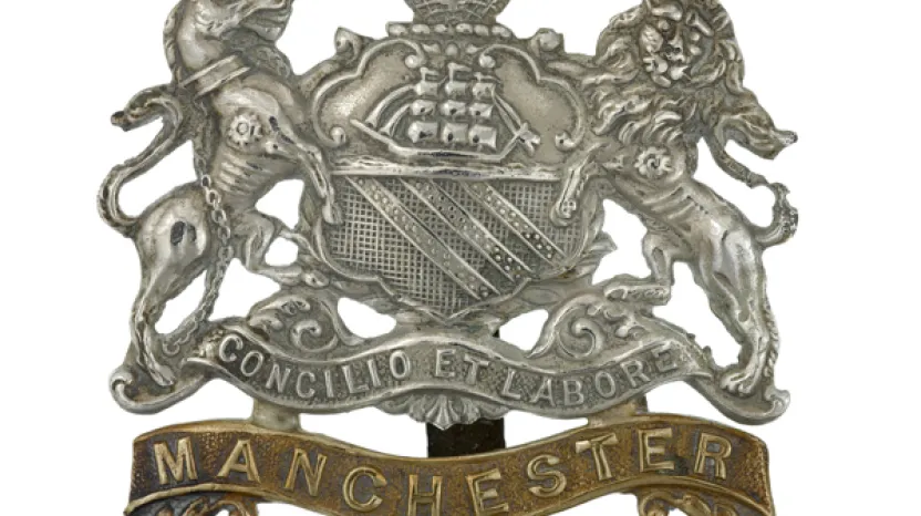 Cap badge of The Manchester Regiment, c1914