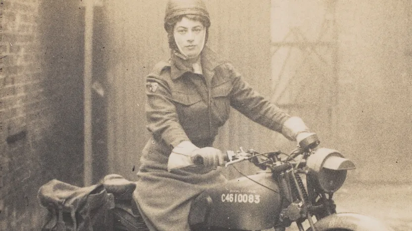 Valerie Erskine Howe, Auxiliary Territorial Service, on a motorbike, c1944