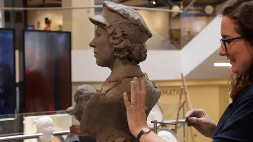 Keziah Burt sculpting a portrait bust of HM Queen Elizabeth II