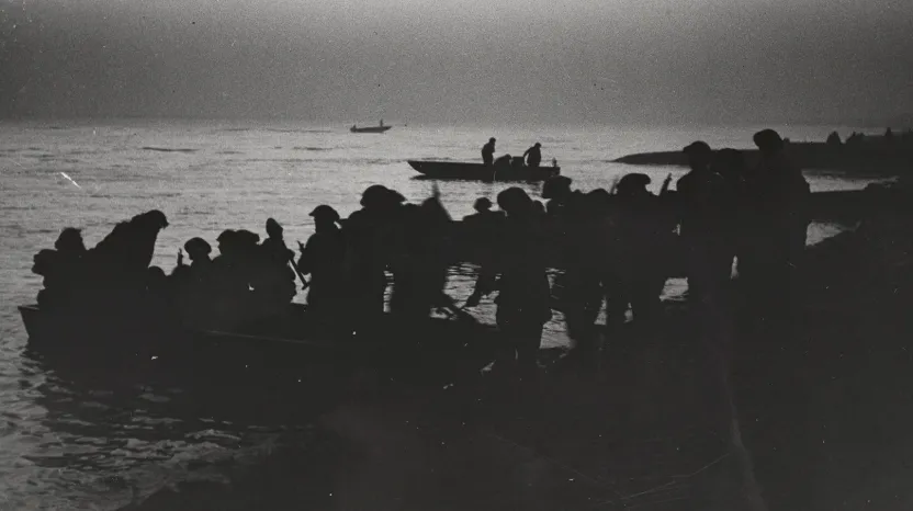 Troops boarding storm boats and crossing the Rhine at dawn, 24 March 1945