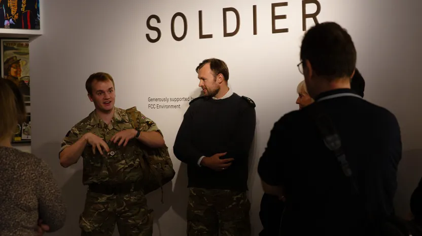 A soldier leading a tour of Soldier gallery