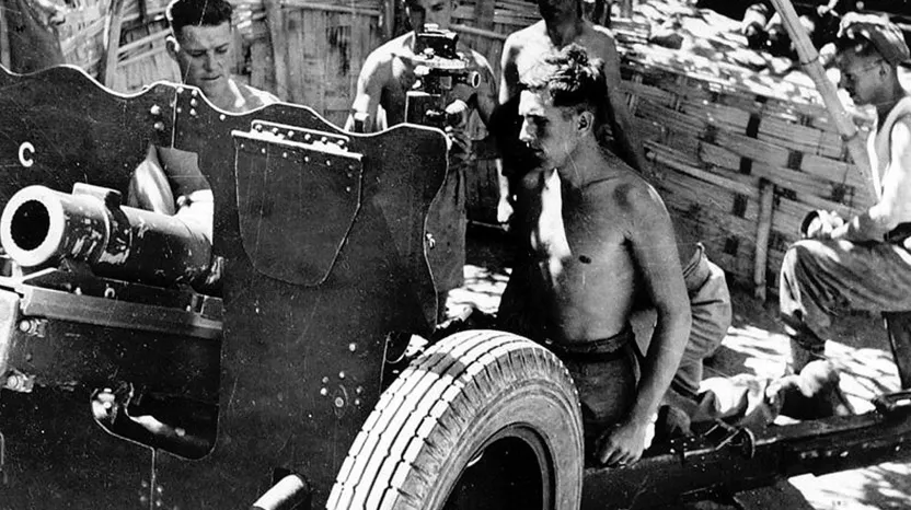 Royal Artillery gun detachment preparing to fire a 3.7 in howitzer during the Battle of the Ngakyedauk Pass, Arakan, February 1944