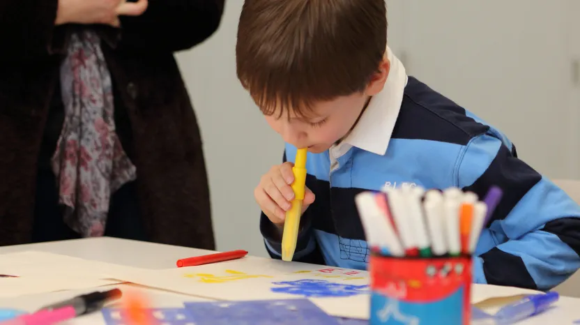 A child taking part in an art workshop at the National Army Museum
