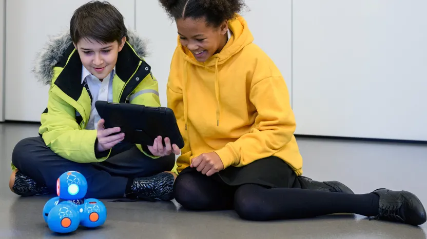 Children taking part in a robot coding challenge at the National Army Museum