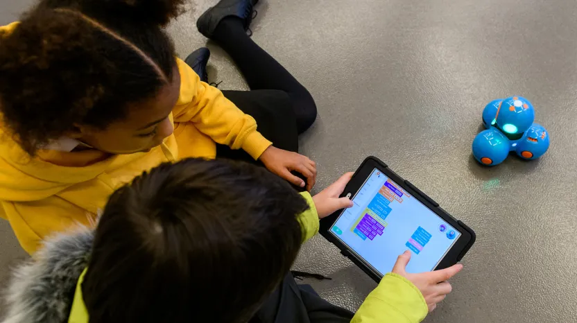 Children taking part in a robot coding challenge at the National Army Museum