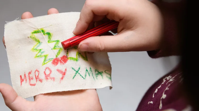 A child completing a craft at the National Army Museum.