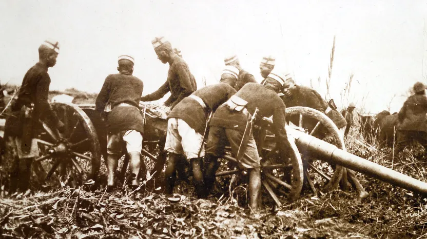 Askaris moving a field gun in East Africa