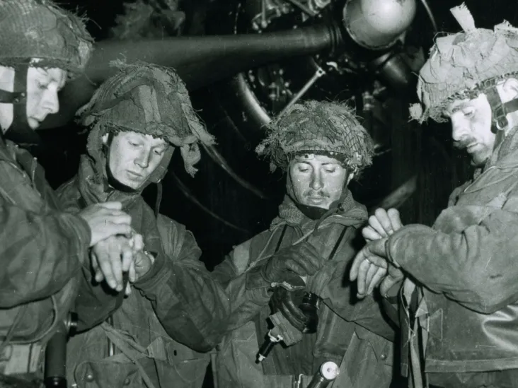 Airborne troops synchronising their watches before the invasion, 5 June 1944