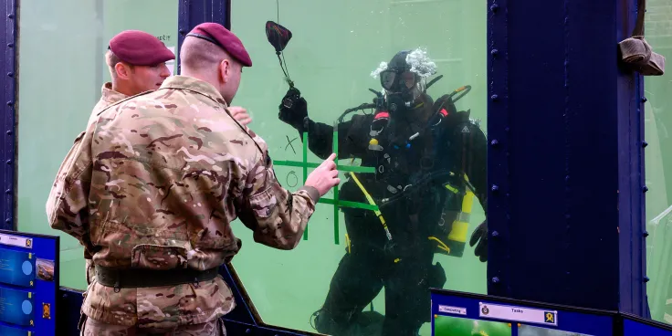 A Royal Engineers diver in a water tank