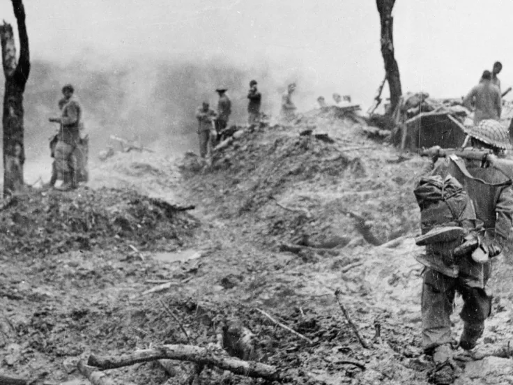 Men of the 10th Gurkha Rifles clearing enemy positions on 'Scraggy' hill, Burma, 1944