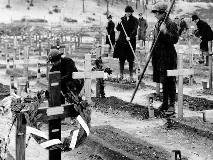 Queen Mary's Army Auxiliary Corps Tending graves in cemetery at Etaples, 1919