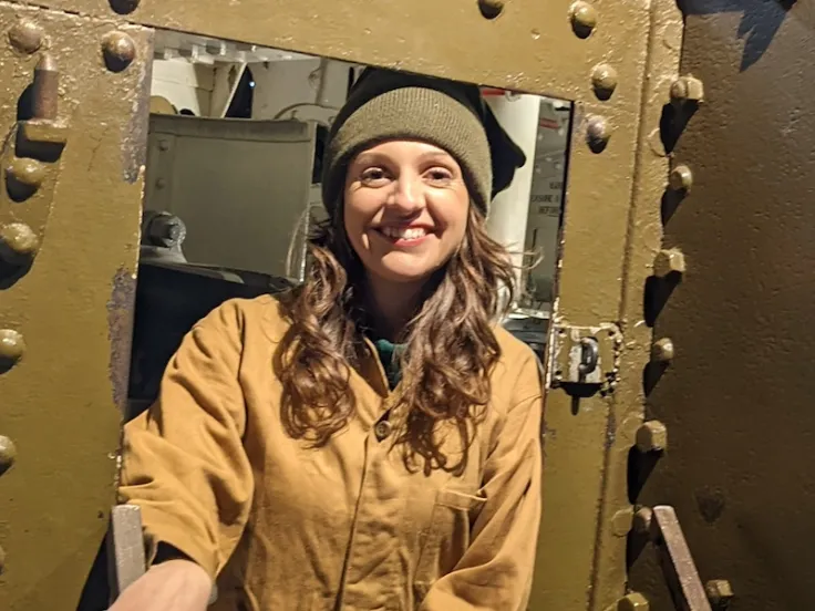 Storyteller Lauren Greirson with a tank