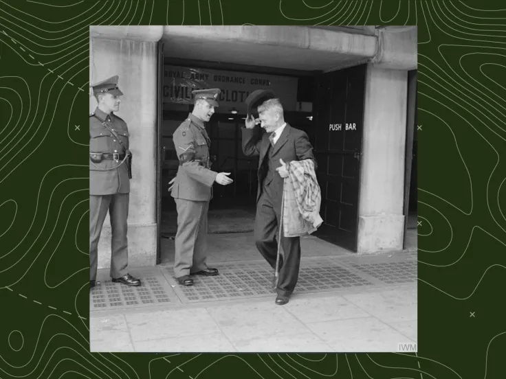 Mr Bill Krepper, late of the Pioneer Corps, leaves the demobilisation clothing depot at Olympia, London, as a civilian, wearing his demob suit, July 1945