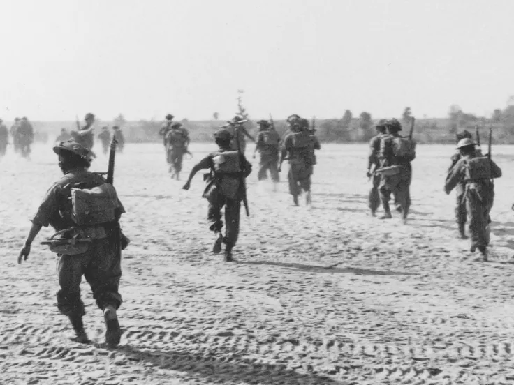 British troops advancing during the fighting at Meiktila, Burma, February 1945