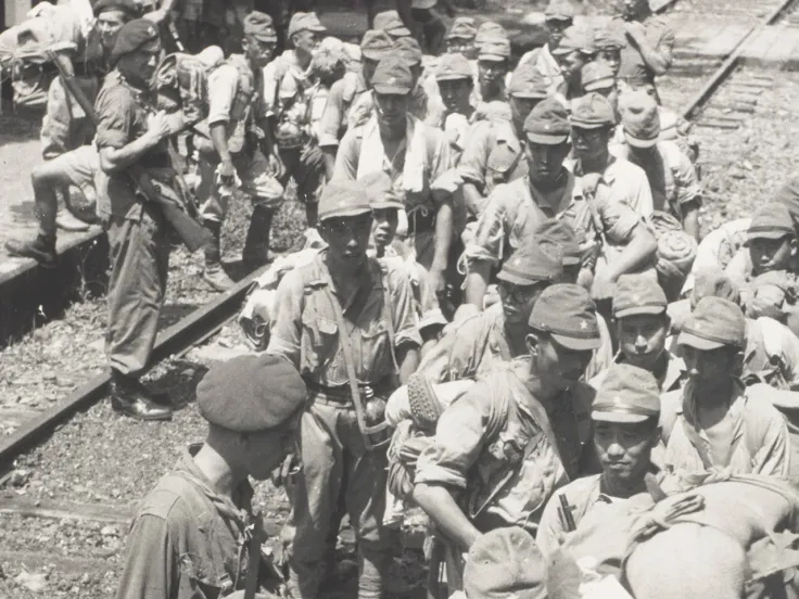 3rd Commando Brigade escorts captured Japanese soldiers, Hong Kong, 15 September 1945