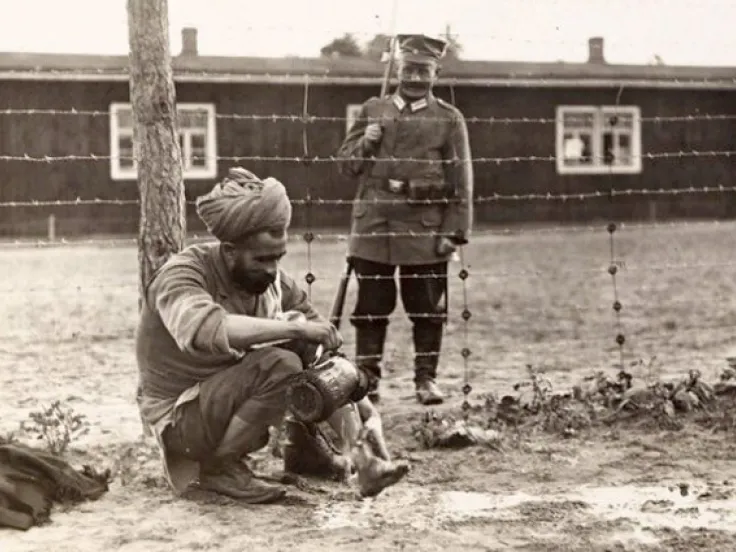An Indian prisoner at Halbmondlager preparing for prayers, c1916
