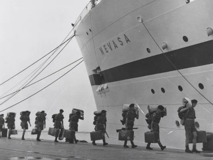 Boarding the troopship ‘Nevasa’ on route to Malaya, 1957