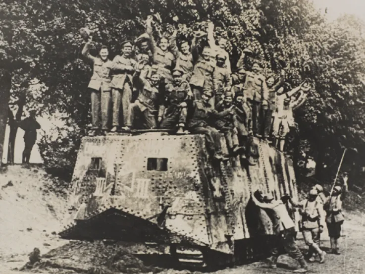 Allied soldiers on the roof of a captured A7V tank, 1918