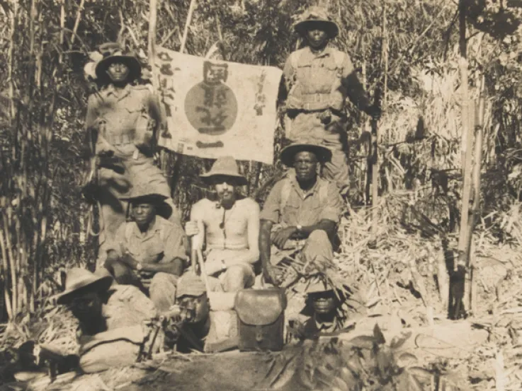 East African soldiers with a captured Japanese flag, 1944 