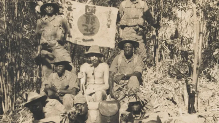 East African soldiers with a captured Japanese flag, 1944 