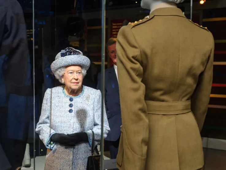 Queen Elizabeth II views her old uniform at NAM, 2017