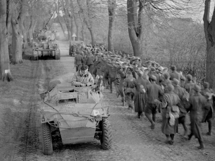 Passing German prisoners of war when moving up to the Aller, Germany, April 1945