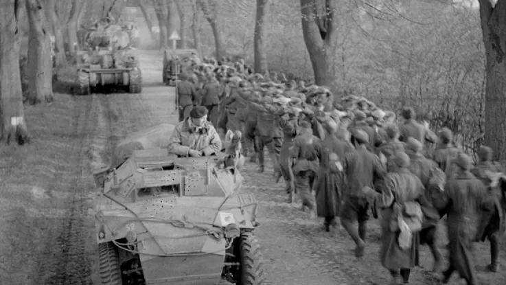 Passing German prisoners of war when moving up to the Aller, Germany, April 1945