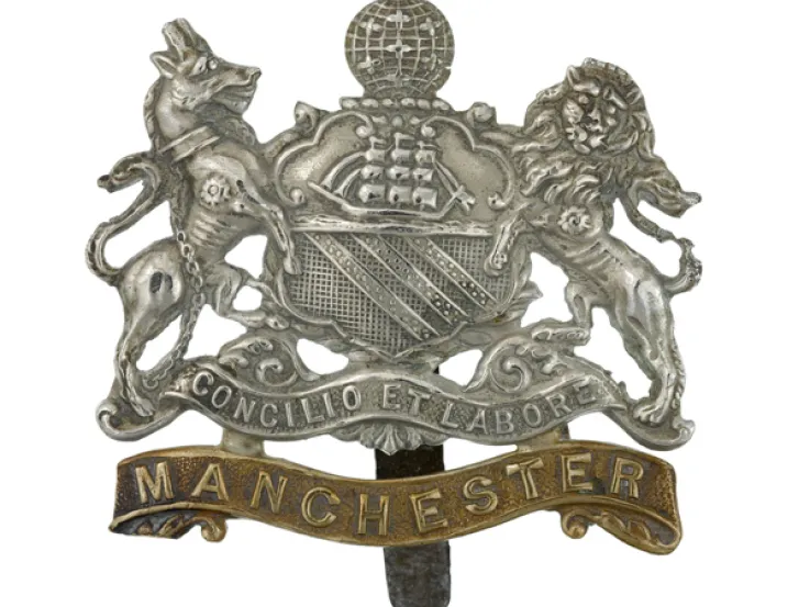 Cap badge of The Manchester Regiment, c1914