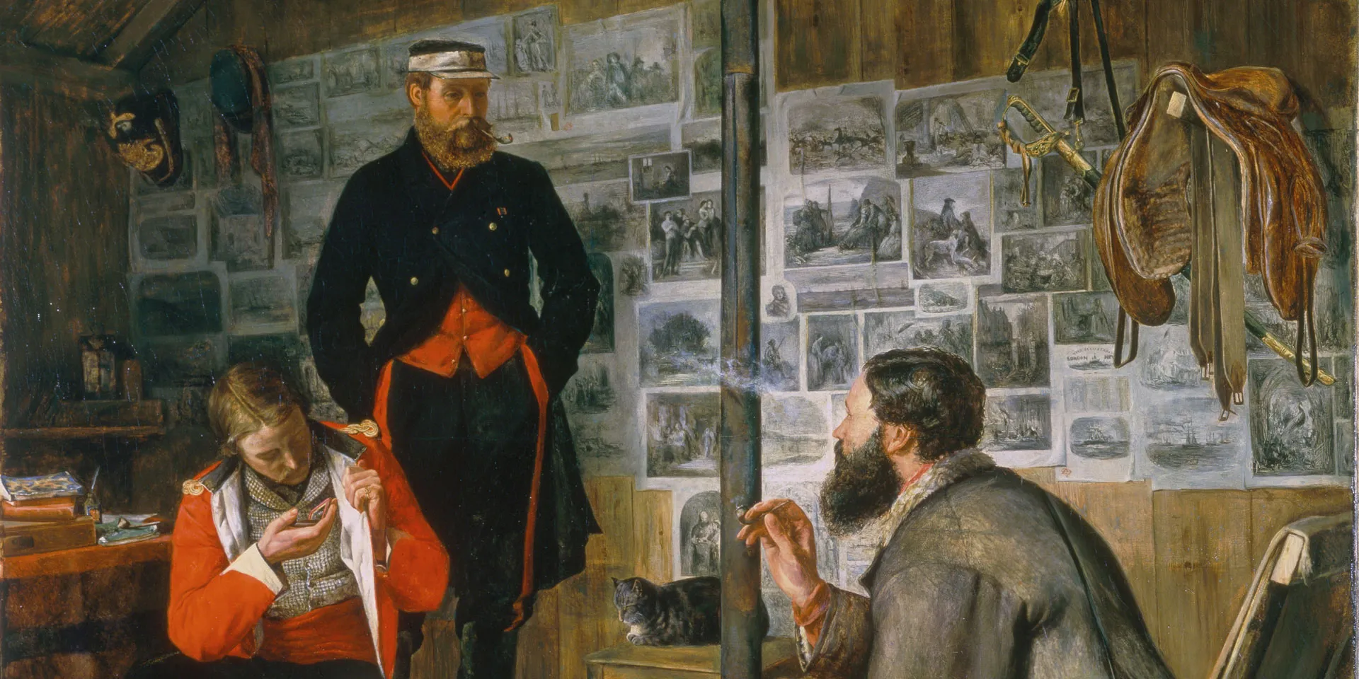 Pages from the illustrated press decorate the walls of the hut in ‘A Welcome Arrival’, 1855. A painting by John Luard, 1857